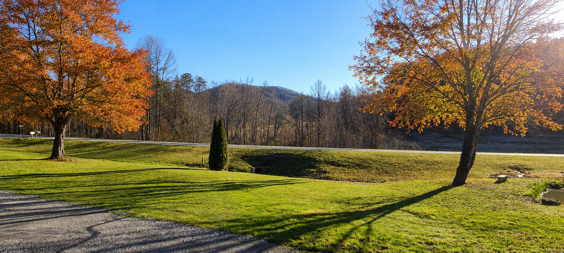 View from the lodge porch in autumn — fall foliage and mountains